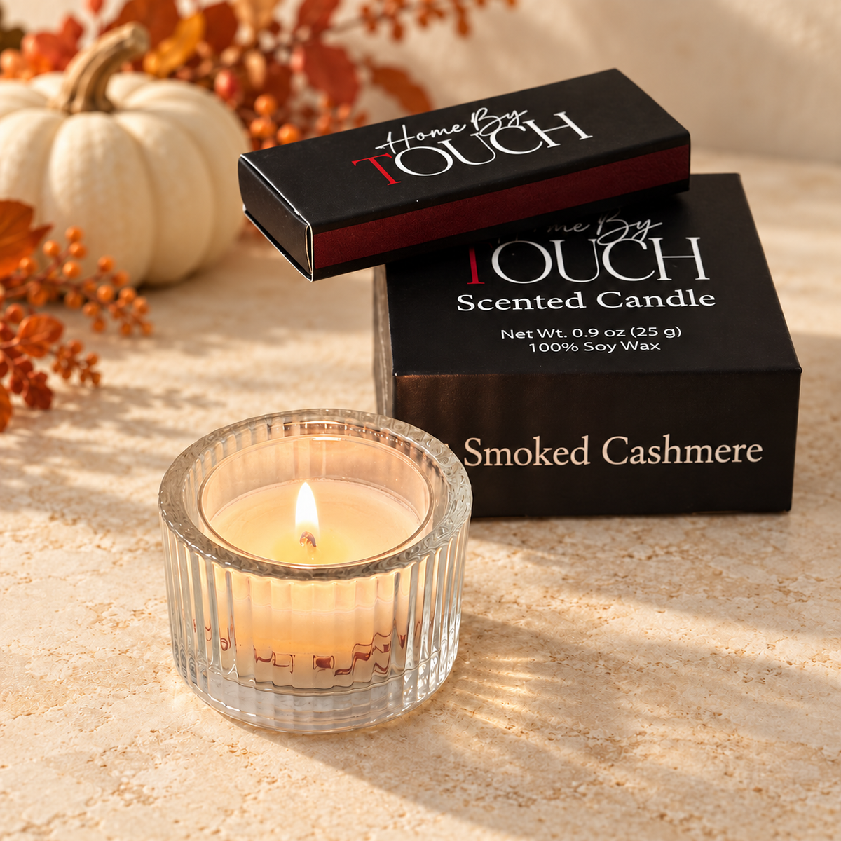 Example Home By TOUCH gift set with one tea light sample, one ribbed glass holder and one luxury matchbox. Complimentary sample fragrance varies.