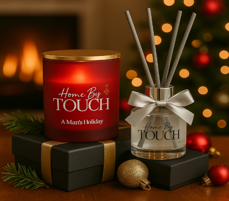 Red candle and diffuser with 'Home By Touch' branding against a festive background.