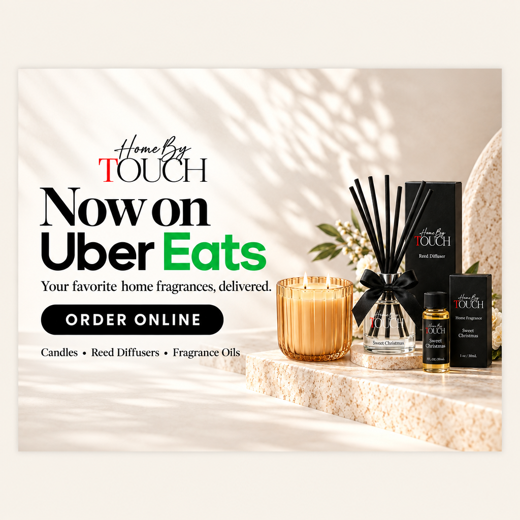 Promotional banner for Home By TOUCH, showing a gold candle, a reed diffuser with black reeds, a small fragrance oil bottle, and black product boxes on a marble surface. Large text reads 'Now on Uber Eats' with an 'ORDER ONLINE' button.